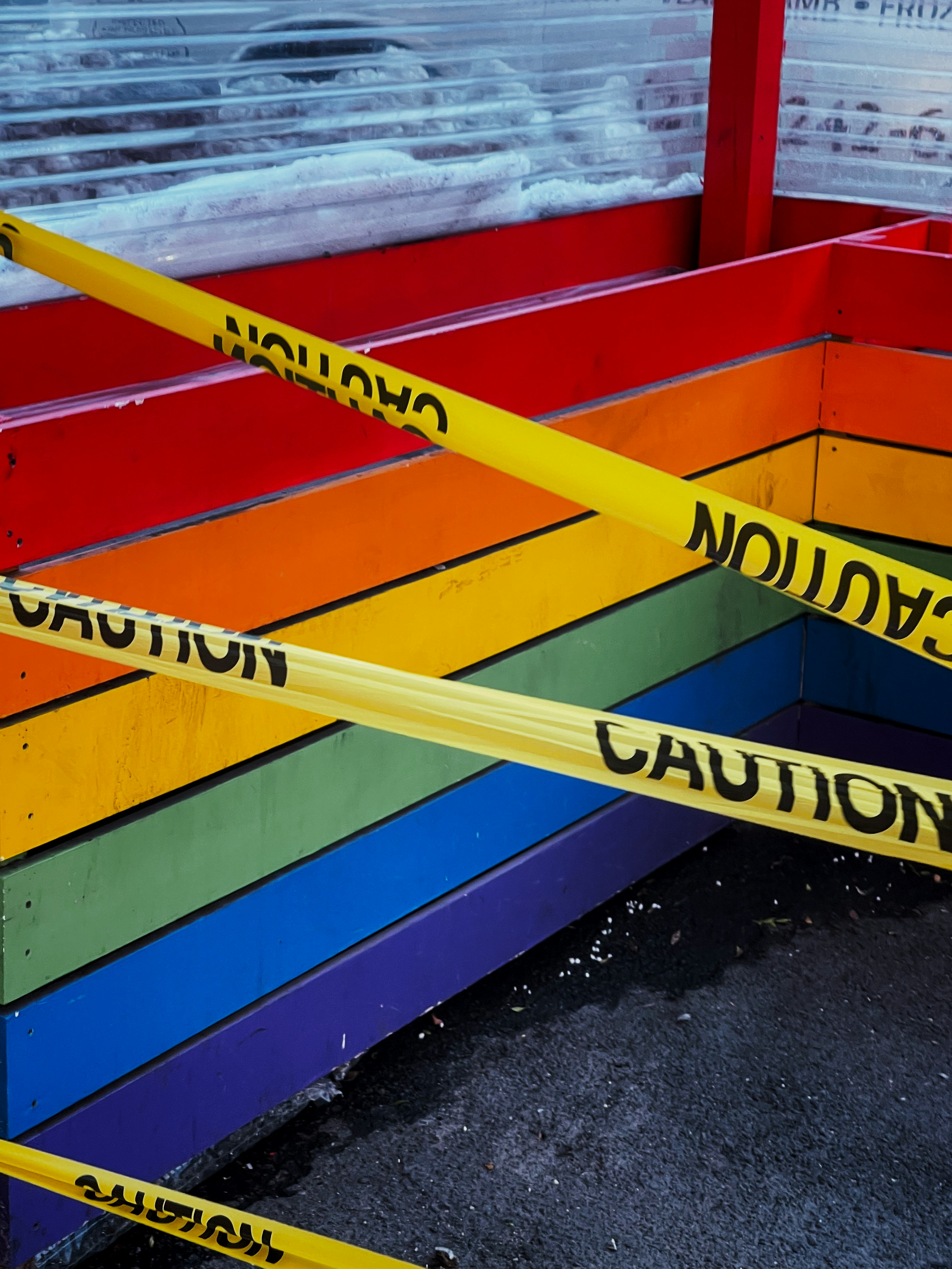 yellow blue and red wooden fence